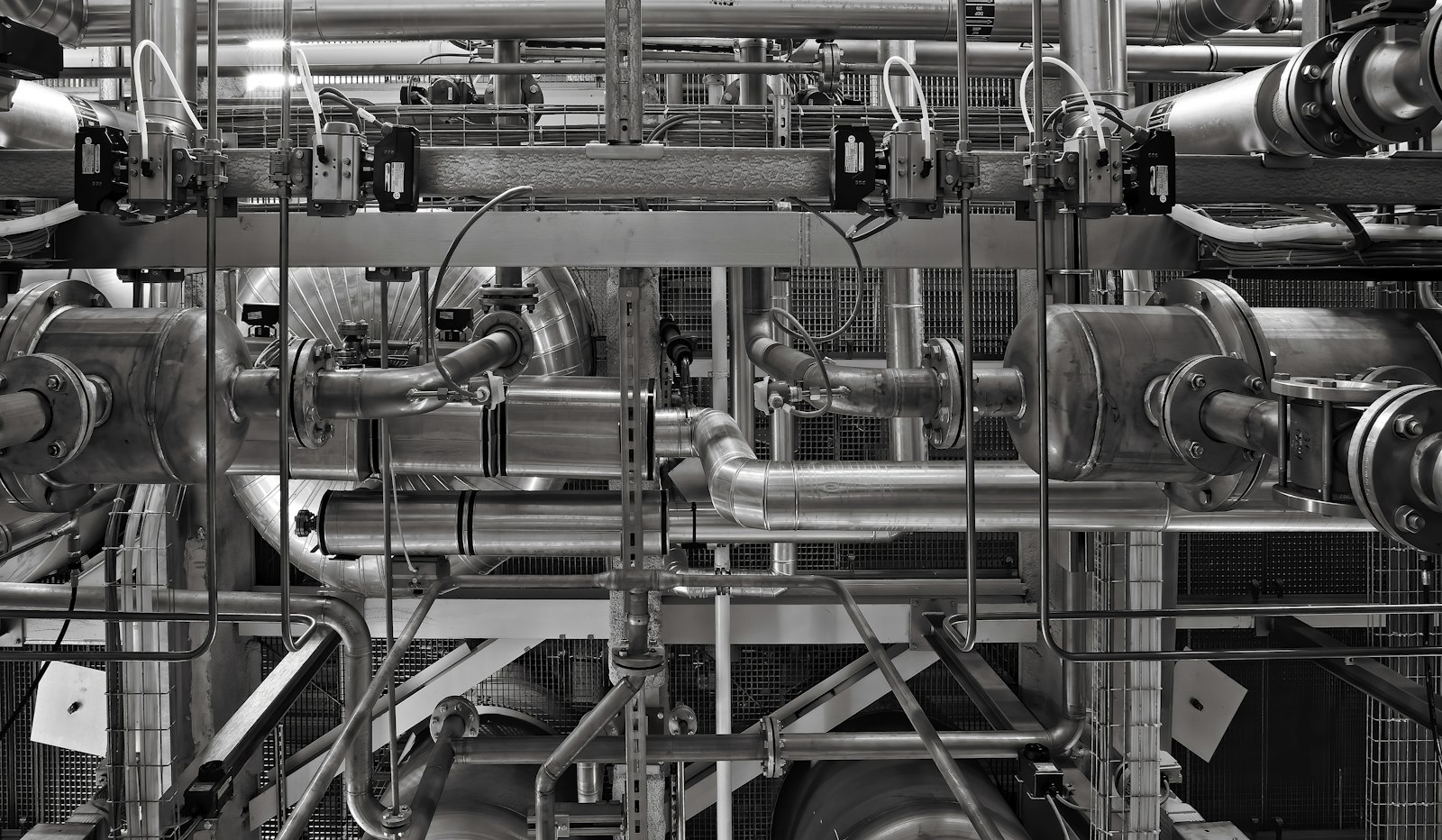 Dense network of industrial pipework, valves and instrumentation